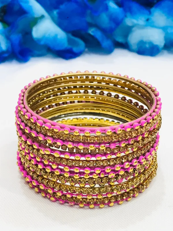 Bracelets with spiral designs for eye-catching twist -Dazzling Pink Color Dot Designed Metal Bangles For Girls