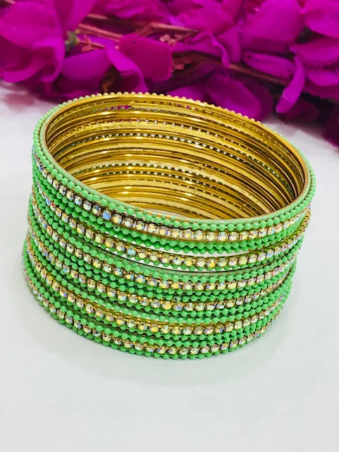 Bracelets with wave engravings for ocean vibes -Alluring Green Color Metal Bangles With White Stone For Women