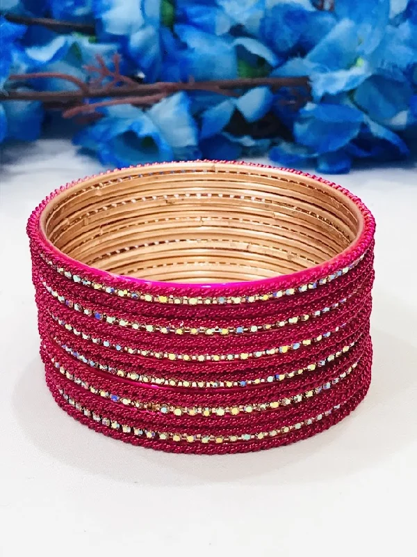 Bangles with topaz gems for icy blue -Beautiful Pink Colored Traditional Wear Metal Bangles For Women