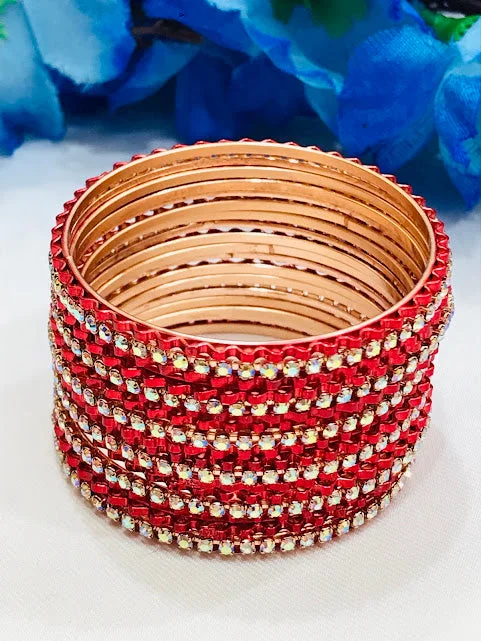 Bracelets with sleek topaz for icy shine -Attractive Red Color Metal Bangles Set With Stones For Girls