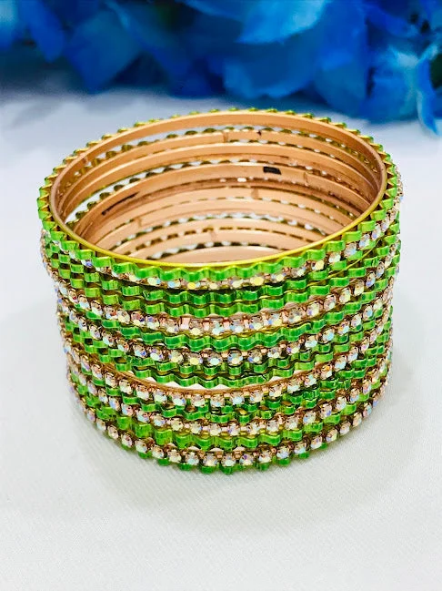 Bracelets with crescent moon for lunar appeal -Appealing Green Colored White Stoned Bangles For Girls