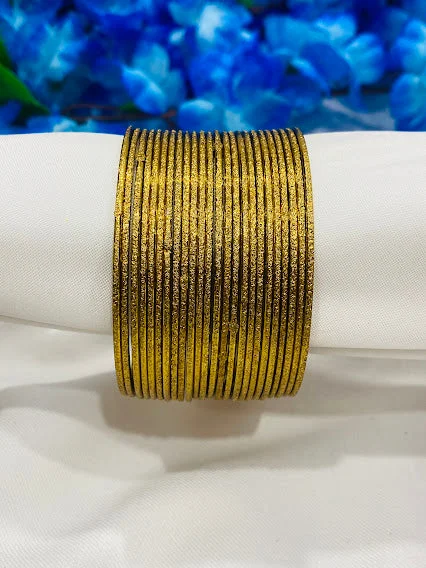 Bangles with blue quartz for cool tones -Lovely Glittery Gold Plated Designer Party Wear Thin Metal Bangle Sets