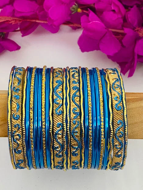 Bangles with gothic-inspired engravings for drama -Elegant Bollywood Style Wedding Blue Color Designer Metal Bangles