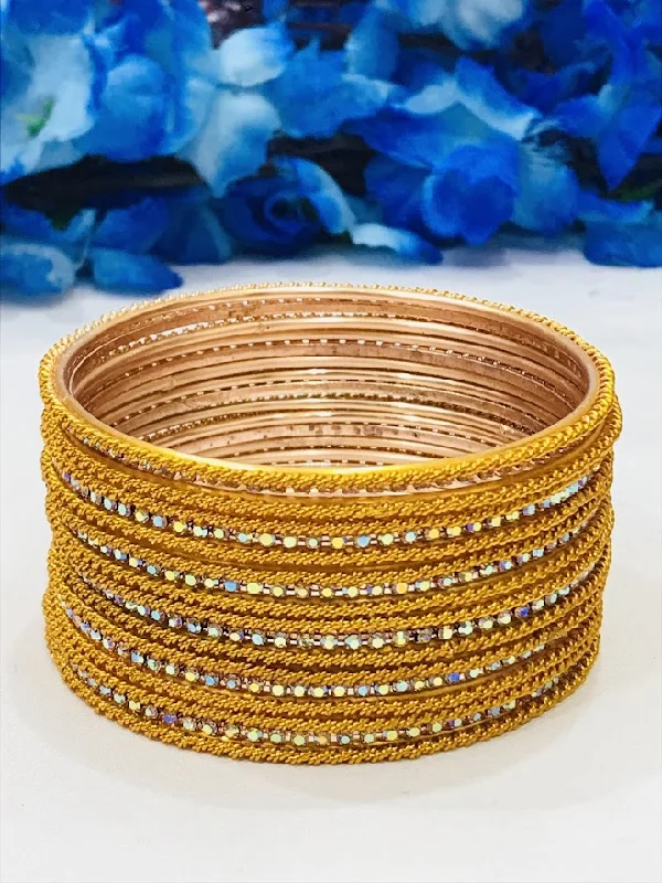 Bangles with peacock ore for iridescent glow -Appealing Yellow Colored Designer Metal Bangles With White Stones