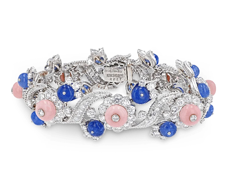 Bracelets with etched floral bands for detail -David Webb Sapphire Bracelet, 23.28 Carats