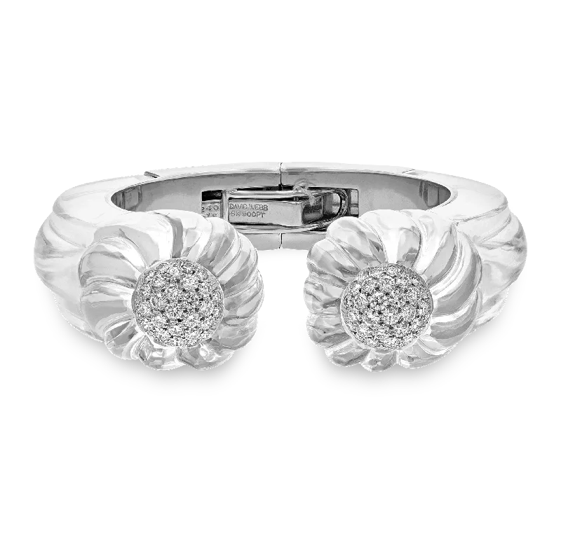 Silver bangles with polished mirror finish shine -David Webb Carved Rock Crystal and Diamond Bracelet