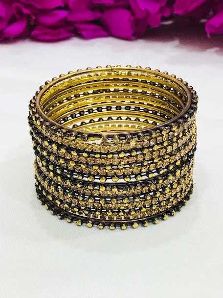 Rose gold bangles with geometric cutout designs -Stunning Black Color Designed Metal Bangles For Girls