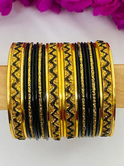 Bracelets with etched floral bands for detail -Indian Ethnic Black Color Metal Bangles With Golden Work