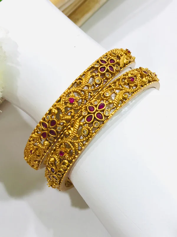 Bracelets with floral motifs for romantic touch -Elegant Matte Finished Antique Gold Bangle Set With Ruby Stones