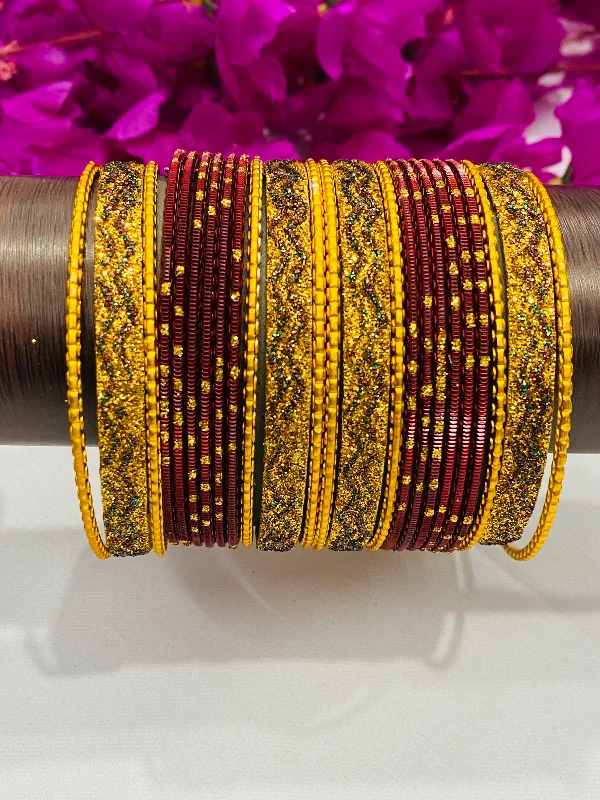 Bangles with sleek black agate for edge -Attractive Maroon Gold Color Designer Metal Bangle Set