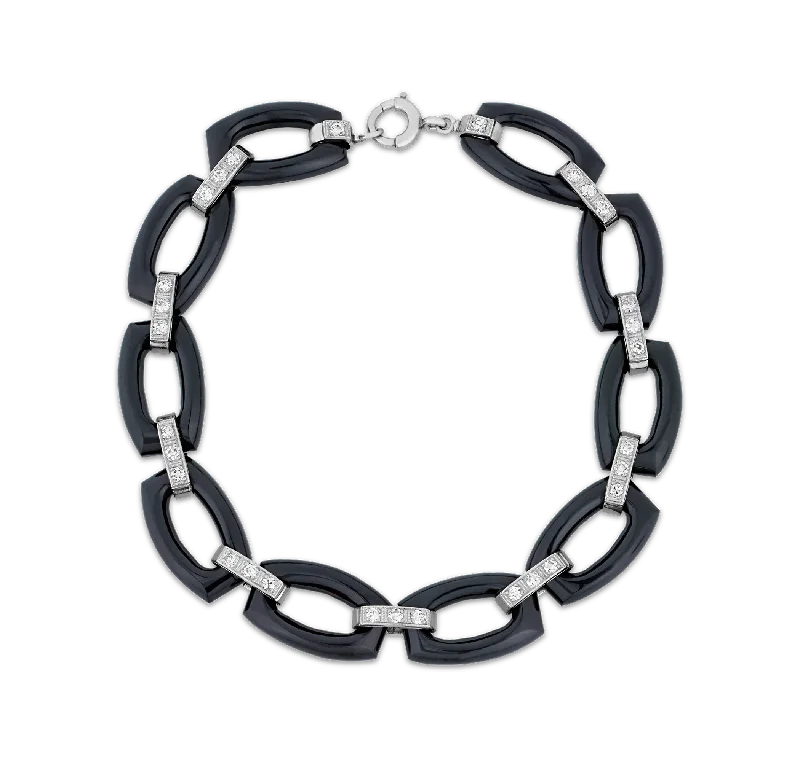 Bracelets with wave engravings for ocean vibes -Tiffany & Co. Art Deco Onyx Bracelet