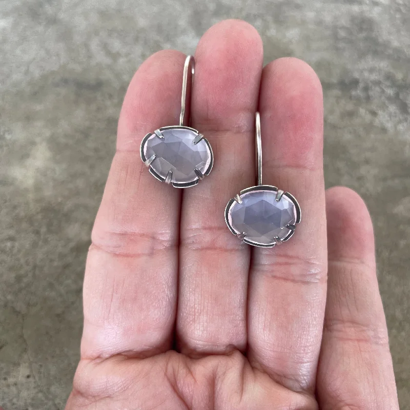 Hoop earrings with stacked layers for a bold and textured design-faceted freeform rose quartz earrings