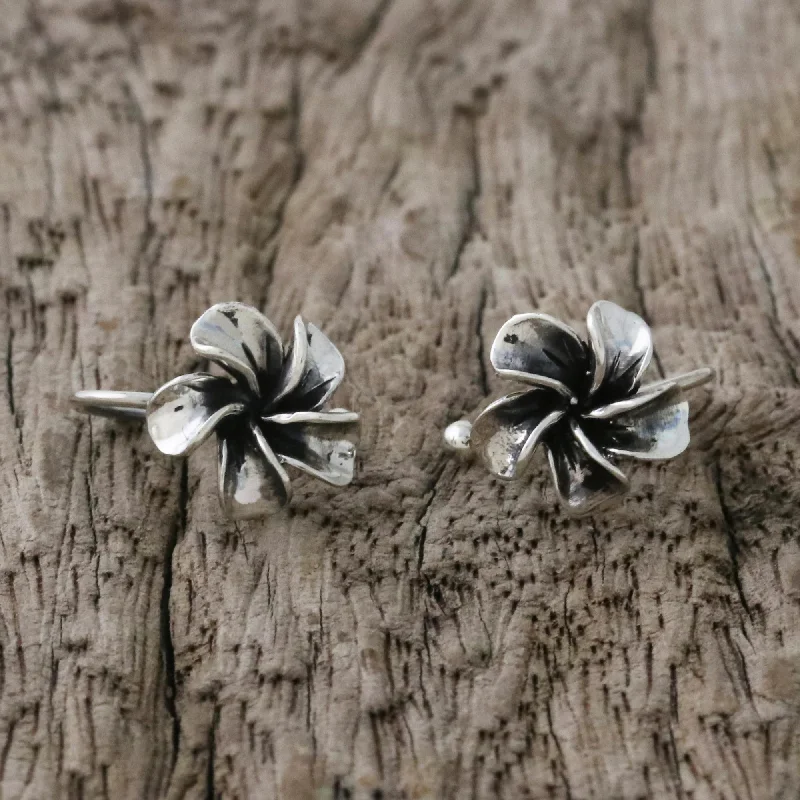 Classic hoop earrings with a thin profile for a sleek and subtle style-Frangipani Spiral Plumeria Silver Ear Cuffs