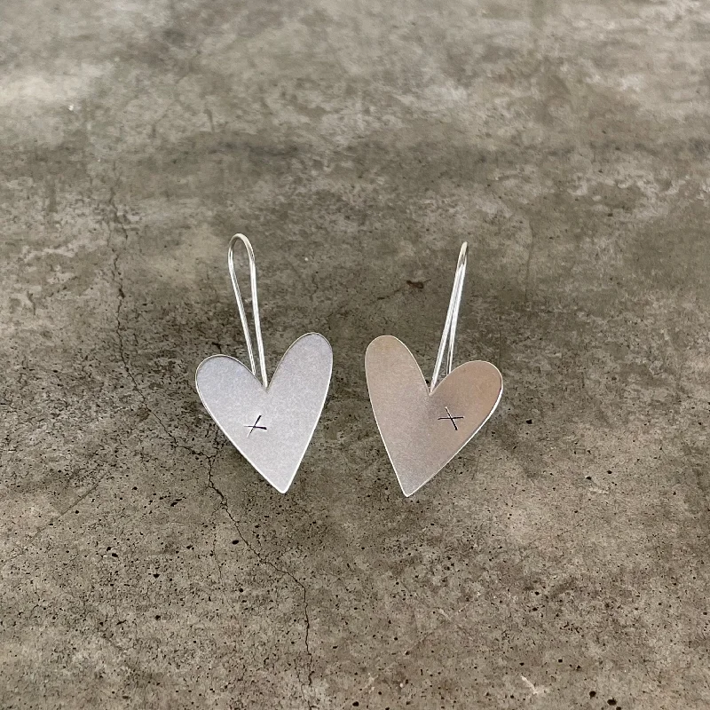 Best hoop earrings with crescent-shaped designs for a bold, moon-inspired style-medium asymmetrical heart earrings