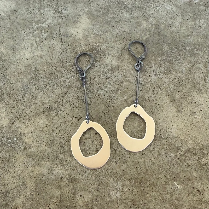 Hoop earrings with snake print designs for an edgy, wild appearance-small thin rough cut two tone earrings