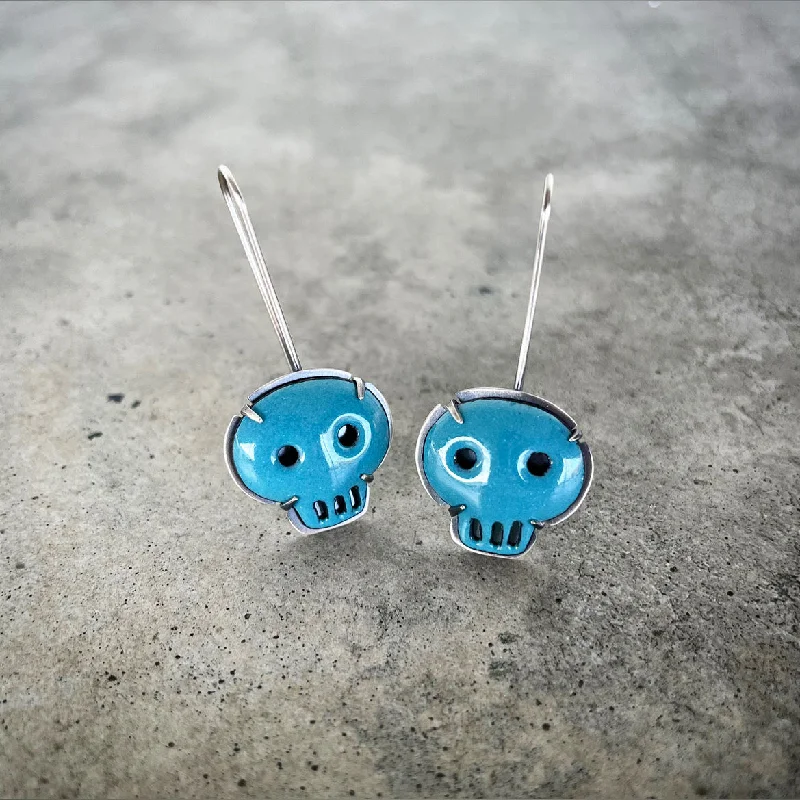 Best hoop earrings with vintage coins for a retro, antique-inspired style-turquoise skull earrings