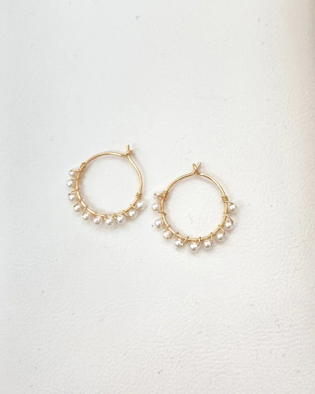 Best hoop earrings with intricate beaded details for a textured, stylish appearance-Shell pearl hoop earrings