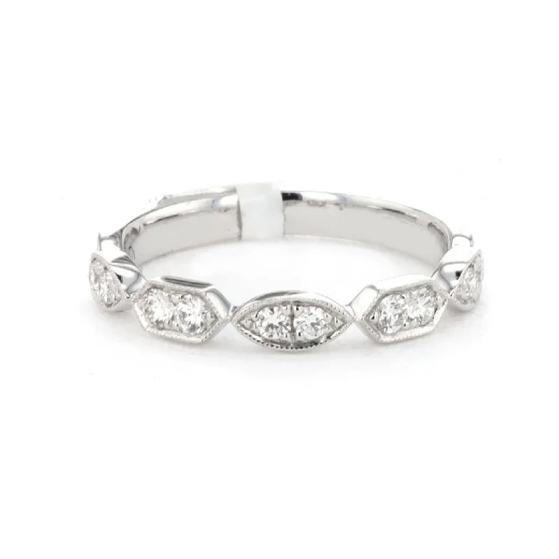 Women’s rings with crown-inspired topaz designs -0.26 ctw Diamond Band